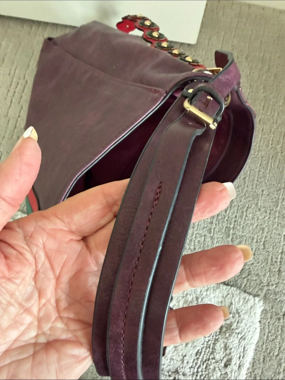 Large Burgundy leather bag with red and green accents